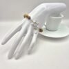 BRACCIALE IN PIETRA PAESINA CON MOLECOLA DI CAFFEINA E CHARM MOKA